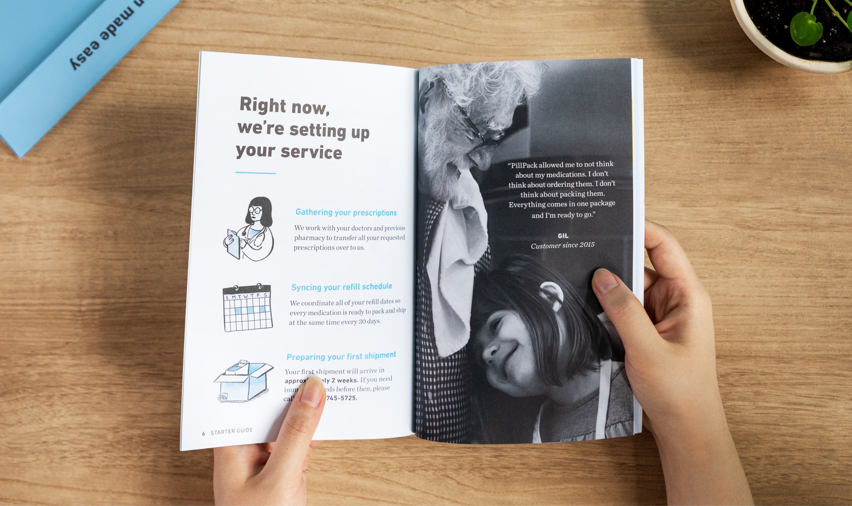 Hand holding a Starter Guide booklet open on a page about setting up service